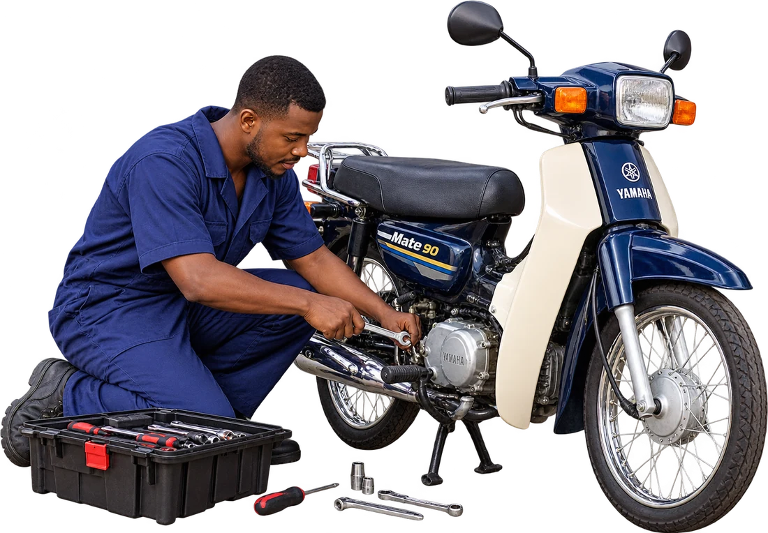 A mechanic repairing a motorbike