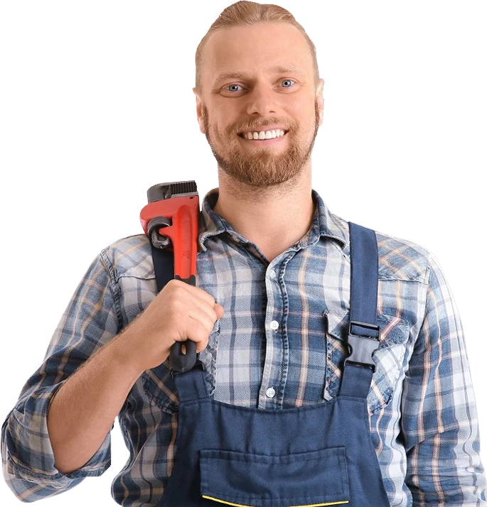 A smiling plumber holding a pipe wrench