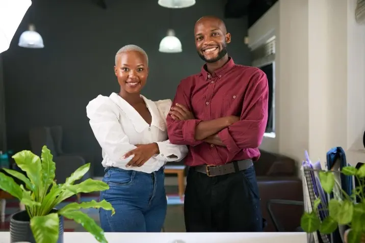 Two professionals standing together